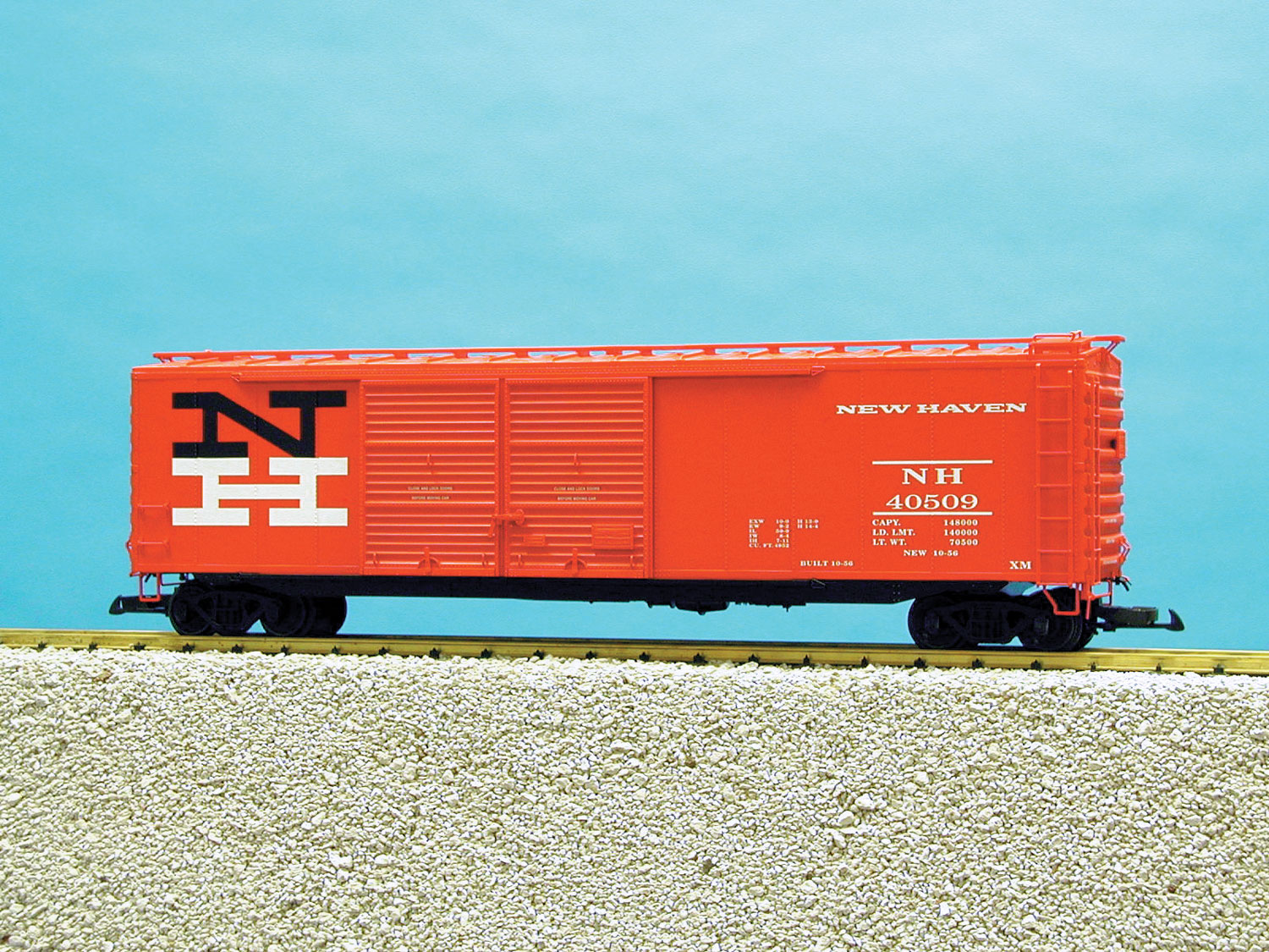 NH 50 BOXCAR W/PLUG/ST COMBO D/DOOR ORANGE